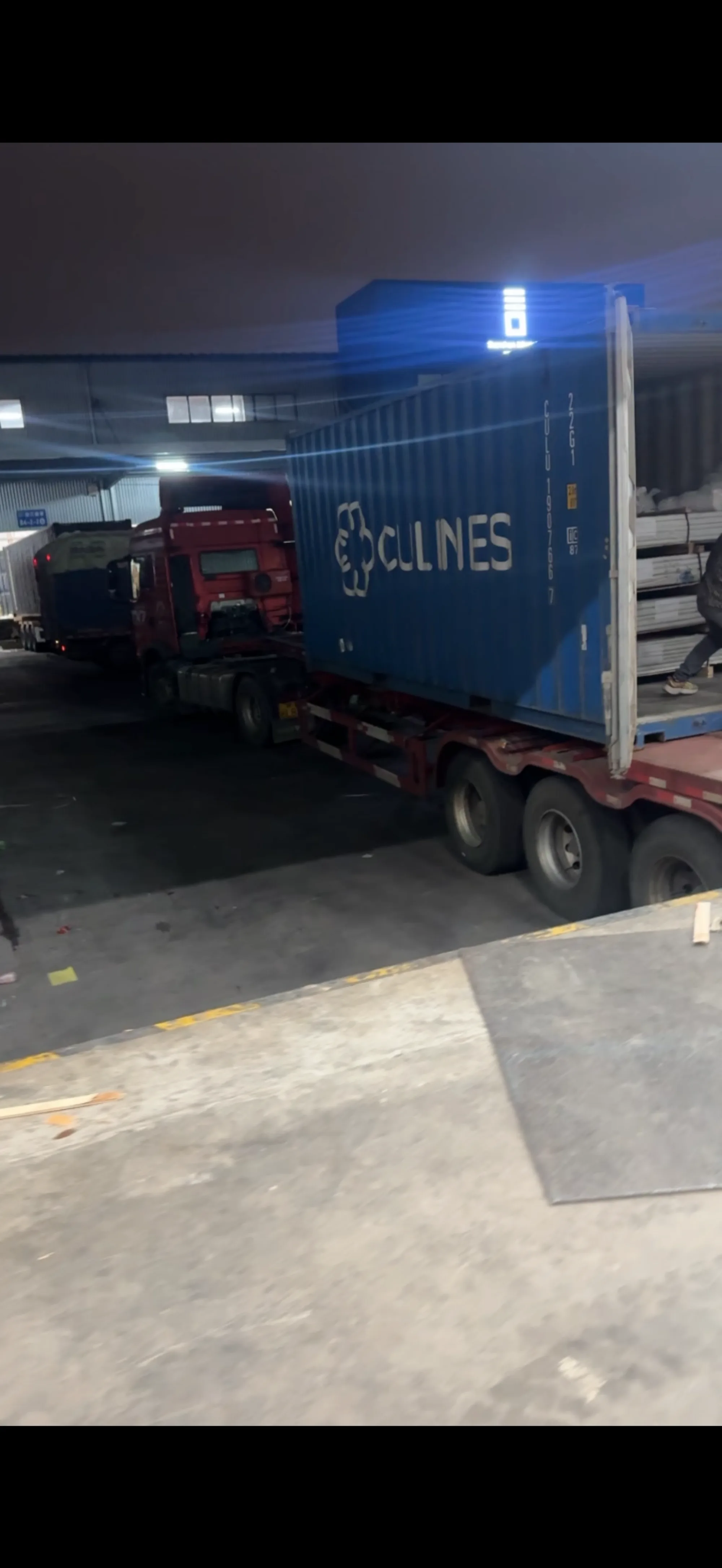 Night-time container loading supervised for export from China