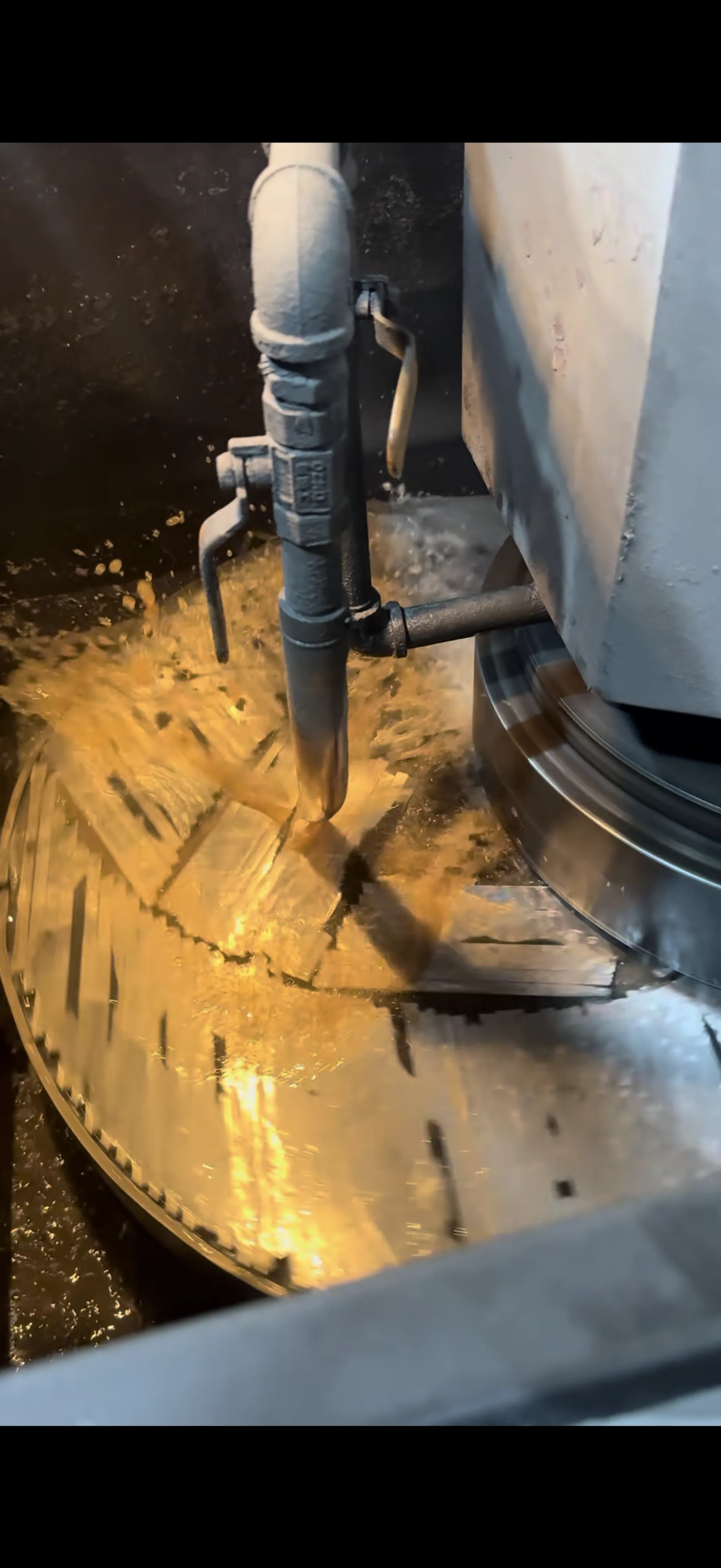 Industrial machining process observed during a factory visit in China